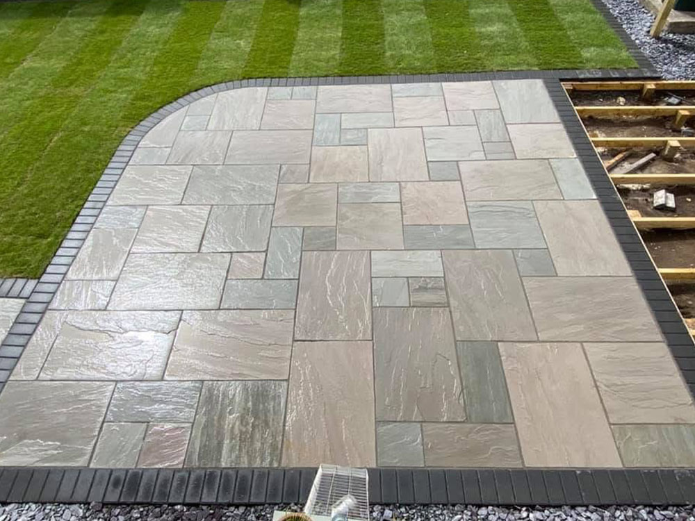 Rounded patio area in back garden 